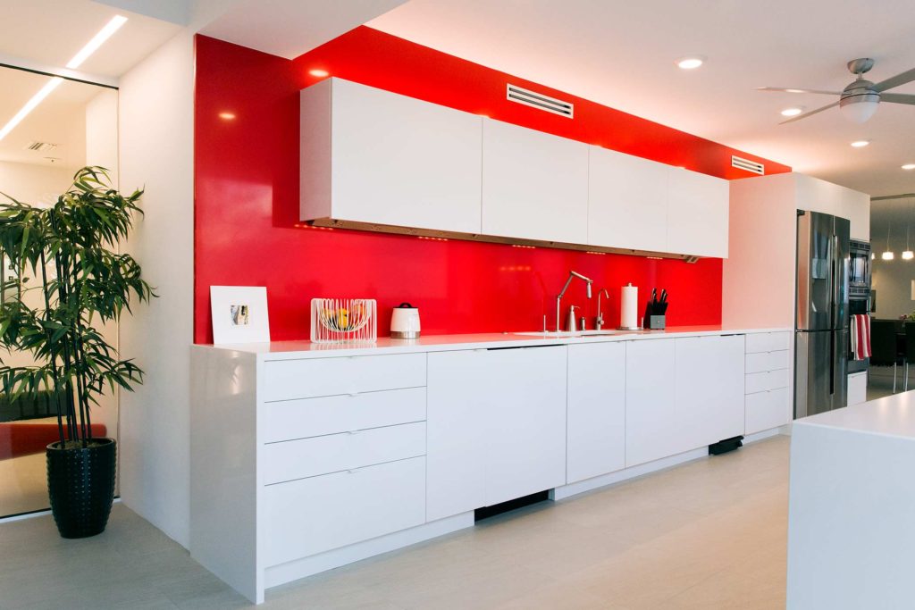 Don't be afraid to play with bold colors, like this cherry red in our Essex House condominium project.