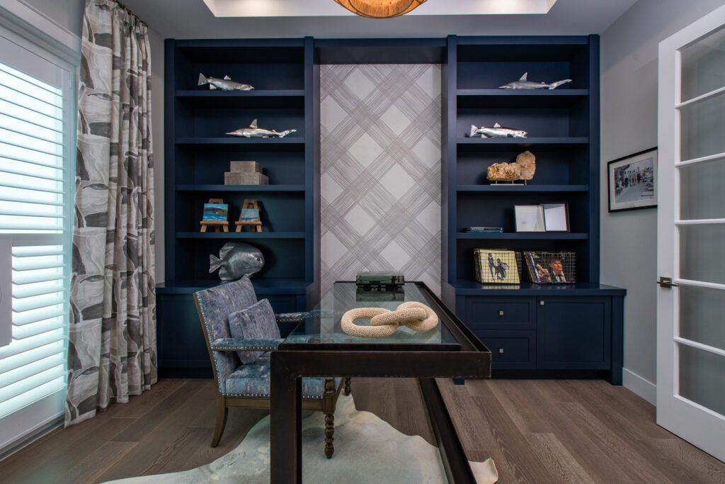 Bold blue cabinetry and dark wood in our client's Nokomis home office.