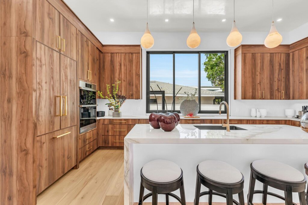 Panel ready appliances in warm wood in our Hyde Park Street project.